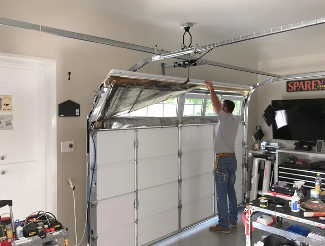 Garage door section replacement by Wellington Garage Door Repair in Wellington