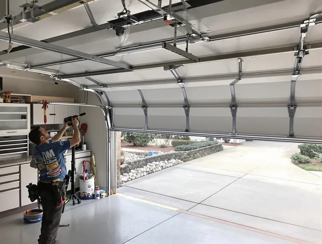 Garage door track repair service by Wellington Garage Door Repair in Wellington